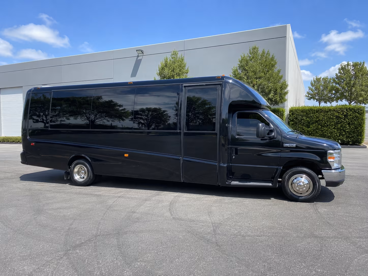 Wedding guests seated inside a party bus serving Boynton Beach